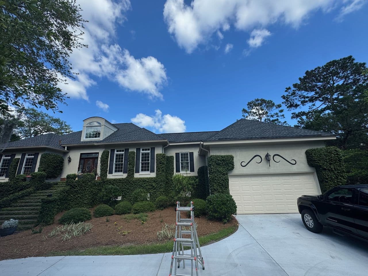 Residential home exterior during an active roofing project