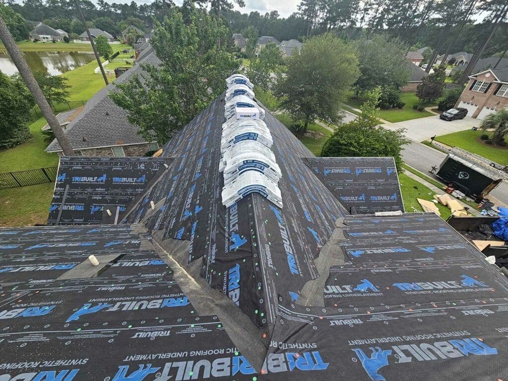 Ridge vents installed along the peak of a new roof