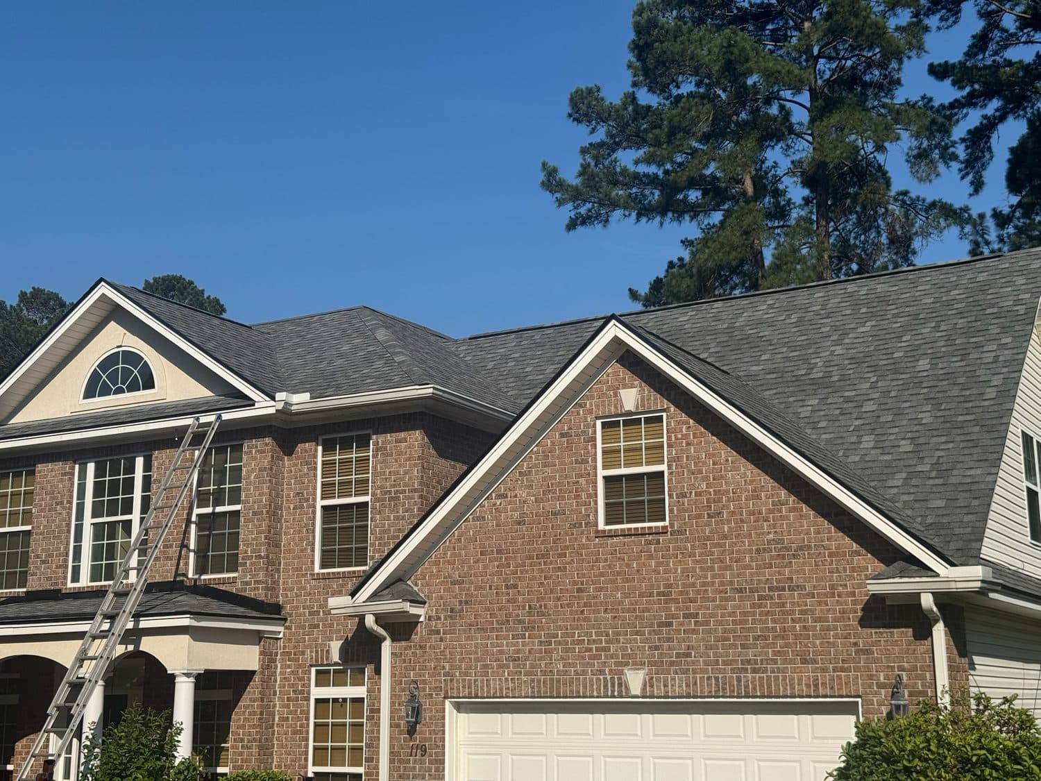 Premium exterior services including siding, gutters, and windows on a Charleston home