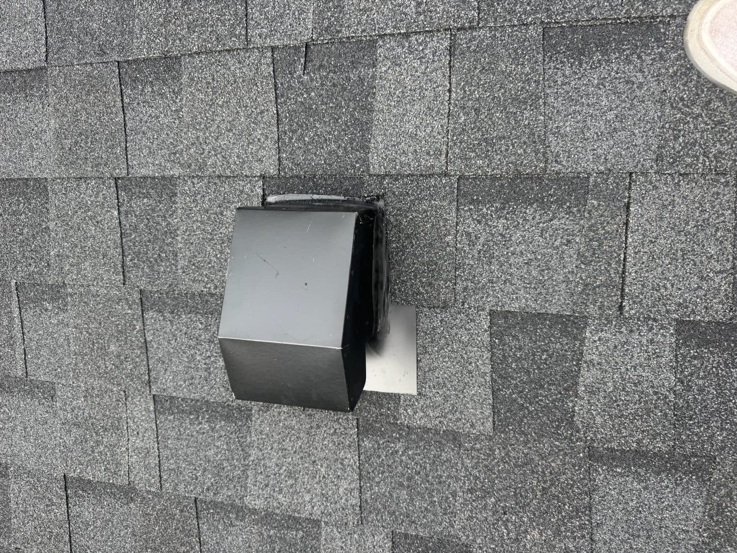 Skilled Roof Repair and Maintenance Professional roofer performing expert shingle repairs on a residential home