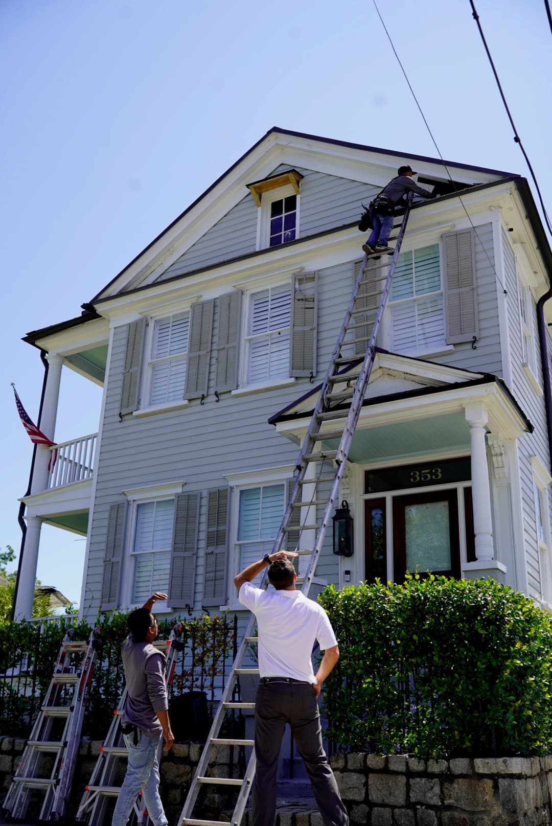 Allen Thompkins and the Tucker Contractors crew on site Owner Allen Thompkins on site with the Tucker Contractors crew during an exterior project in Charleston